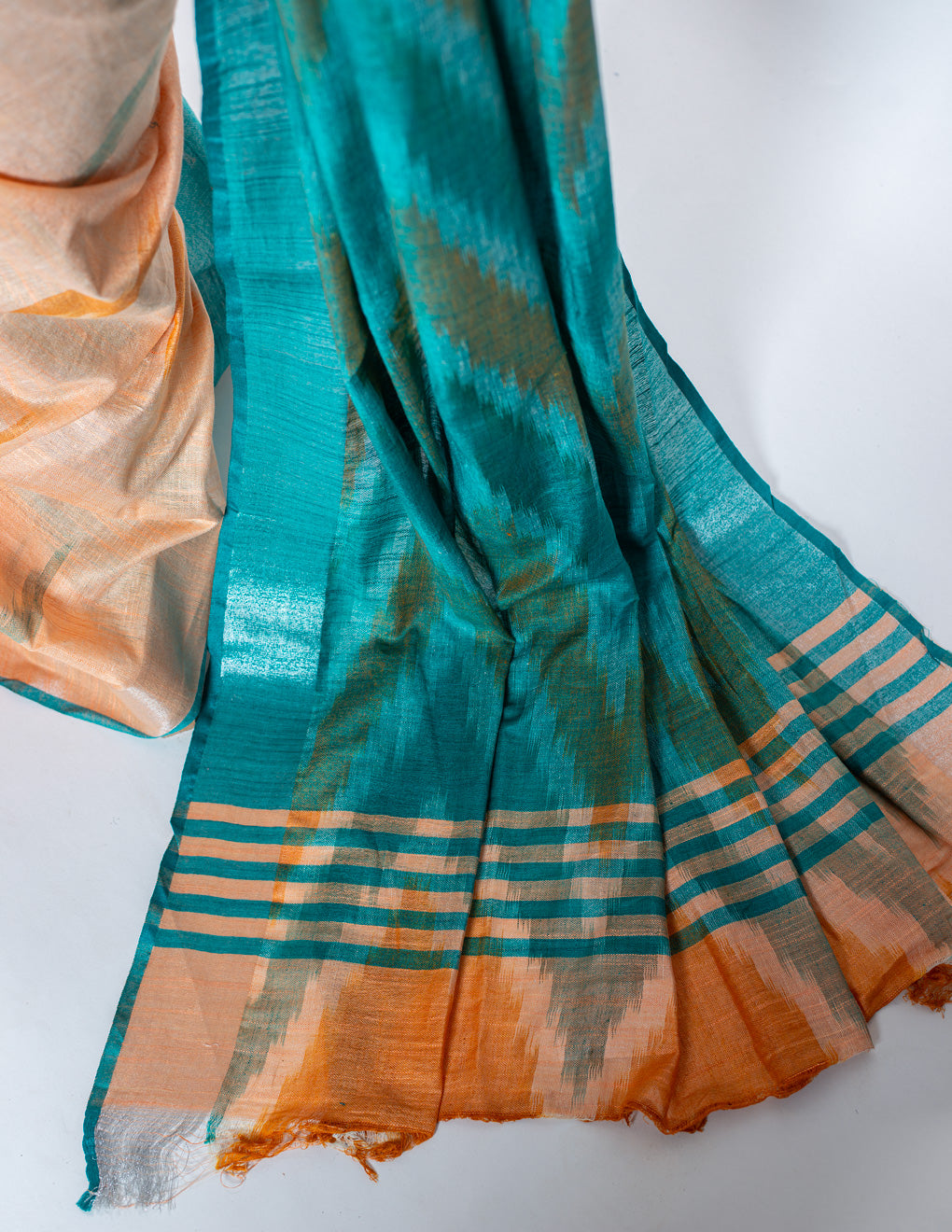 Peach & Green Ikkat Linen Handloom Saree